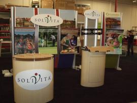 Modified VK-1058 Visionary Designs Hybrid Exhibit with Oval Counter and MOD-1204 Workstation -- Image 1