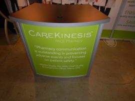 RENTAL: Modified RE-2027 with Tension Fabric Graphics, Halogen Arm Lights, Sintra Wing Panels, and RE-1228 Small Curved Counter -- Image 2