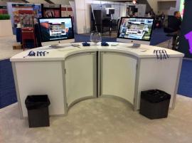 RENTAL: Custom Island Design with 18 & 14 ft. Canopy Structures with SEG Sheer Fabric, 18 ft. High Double-Sided Lightbox with One-Piece Silicone Edge Fabric Graphics -- Image 6