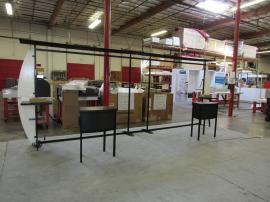 VK-2112 Sacagawea Portable Hybrid Display with Black Powder-coated Frame, (2) MOD-1243 Pedestals, Workstation Counters, Charging Ports, and Monitor Mounts. Shown without Graphics