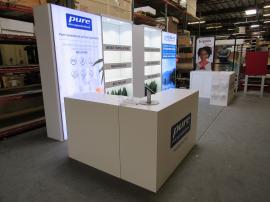 Custom Gravitee One-Step Inline Exhibit with SuperNova Lightboxes, Reception Counters with Locking Storage, Shelves, Puck Lights, and MOD-1371 Rotating iPad Stands.