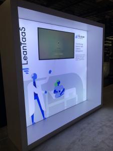 RENTAL: Modified RE-1081 10&rsquo; x 10&rsquo; Lightbox Design with 55&rdquo; Monitor and SEG Backlit Fabric Graphic