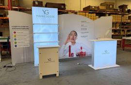 Modified VK-2400 Symphony Display with Curved Frames, SEG Fabric Graphics, (3) Shelves, Monitor Mount, SYM-407 Pedestal, SYM-407B Backwall Pedestal, and MOD-1717 Backlit Counter