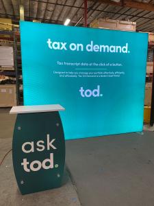 RENTAL:  RE-1042 LED Lightbox with SEG Fabric Graphic and RE-1255 Portable Counter with Locking Storage