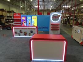 Reconfigurable Gravitee Modular Exhibit with Closet Door Storage, Halo Lit Logo, Shelving, Monitor Mount, (3) Hanging Backlit Graphics, (4) Literature Holders, and (2) Custom Reception Counter with LED Accent Lights and Locking Storage