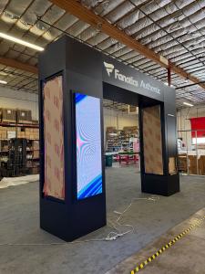 Custom Display Arch with Halo Lit Logo, RGB Programmable Lighting, Adjustable Shelves, and Product Displays