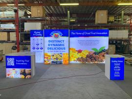 RENTAL: RE-2053 Inline Design with (3) Single-Sided Lightboxes, (2) RE-1566 Backlit Counters, with White Laminated Tops, RE-1572 L-Shaped Backlit Reception Counter with White Laminated Top, SEG Fabric Graphics, and Direct Print Graphics