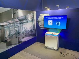 RENTAL: Island Design with L-Shaped Gravitee Panel System Backwall -- View 6