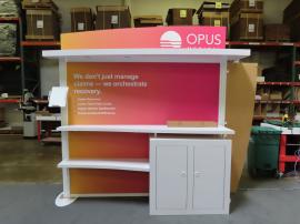 Modified VK-1135 Visionary Designs Modular Exhibit with Puck Lights, Fabric and Direct Print Graphics, Literature Tray, Shelves, Monitor Mount, and Locking Storage