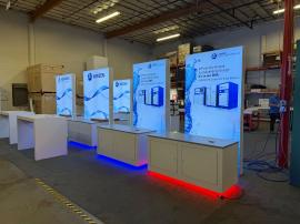 (6) Custom Double-sided Lightboxes (60 x 90 and 48 x 96) with SEG Fabric Graphics and (1) Laminated Counters with Locking Storage and RGB LED Accent Lights