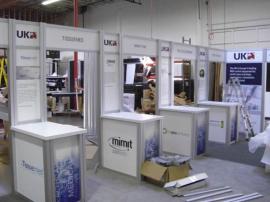 RENTAL Exhibit -- 20' x 30' Island with Internal Workstations (shown with graphics) -- Image 1